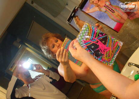 TAC Amateurs are proud to present you with a free pictures featuring Busty Bliss in blowjob scene